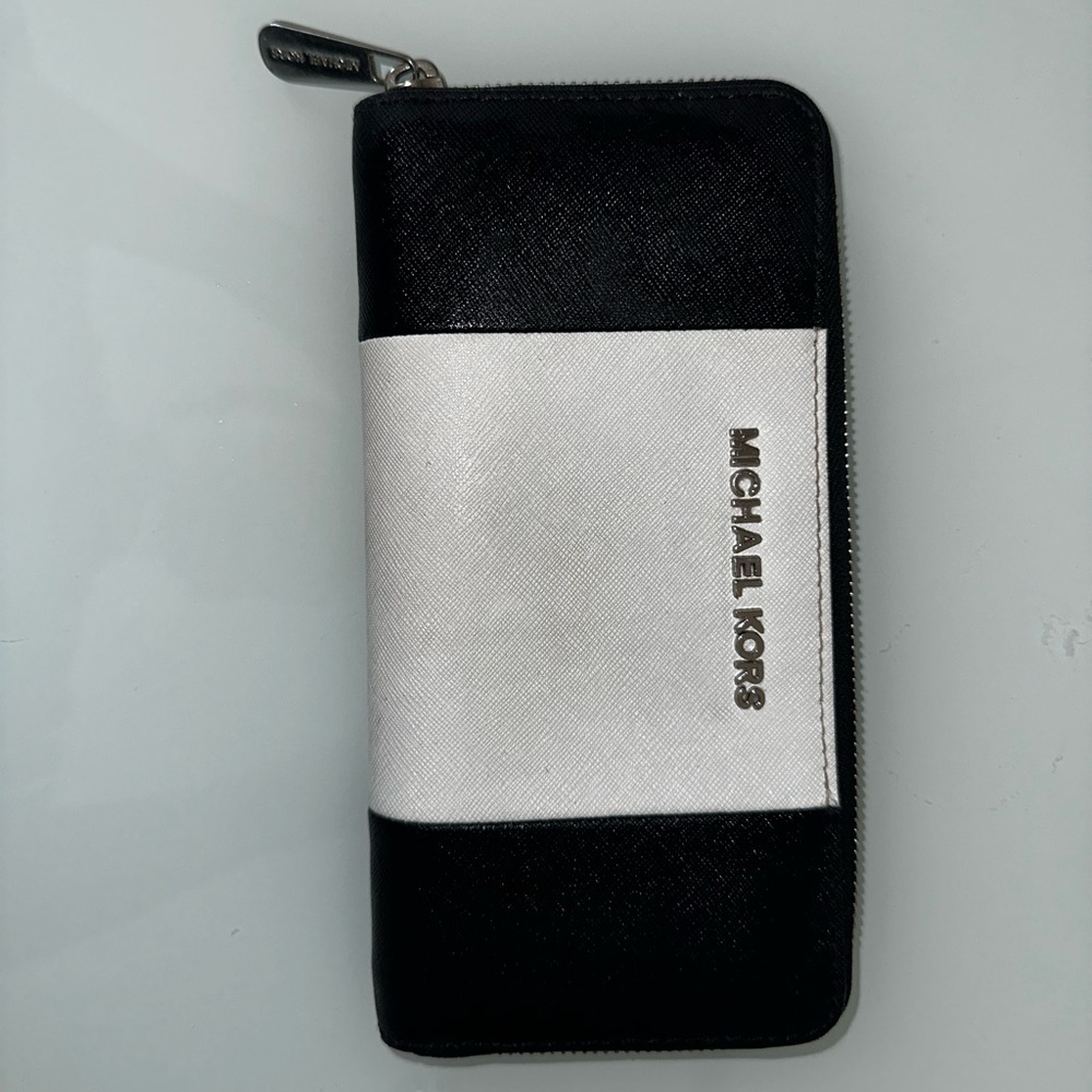 Black and white Michael kors wallet.